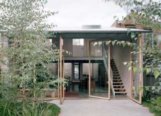 Four Massive Pivot Doors Bring the Outdoors In at This Australian Family Home
