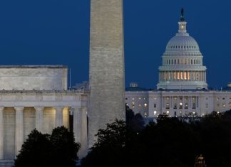 Congress works to complete compromise to reopen government, with final action possible by midweek