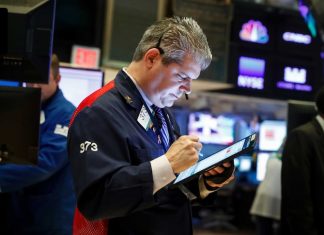Live updates: Wall Street ends mixed after volatile session and ASX set to slip further