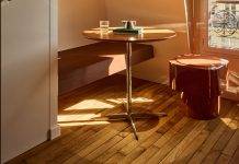 This 161 Square-Foot Attic in Paris Boasts Budget Mahogany Panels and Versatile Furniture