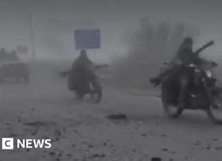 Russian forces use fog cover to push further into key Ukraine town