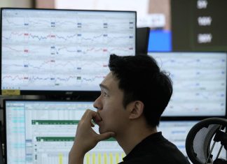 Asian shares fall, tracking Wall Street’s tumble on worries about AI stocks and interest rates