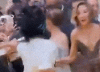 Co-star steps in as Ariana Grande ambushed on red carpet