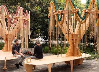 plywood and fabric solar tree installations offer shade in colombia’s urban open spaces