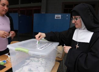 Chileans vote for president as hard right gains ground on crime fears