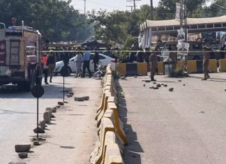 Suicide bomber struck outside an Islamabad court, killing 12, interior minister says