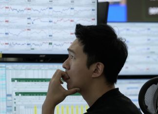 Asian shares fall, tracking Wall Street’s tumble on worries about AI stocks and interest rates