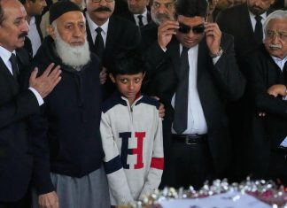 Pakistan investigates the suicide bombing that killed 12 outside an Islamabad court